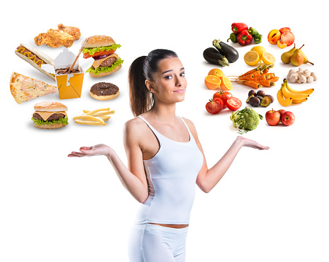 Unhealthy vs healthy food on white background 