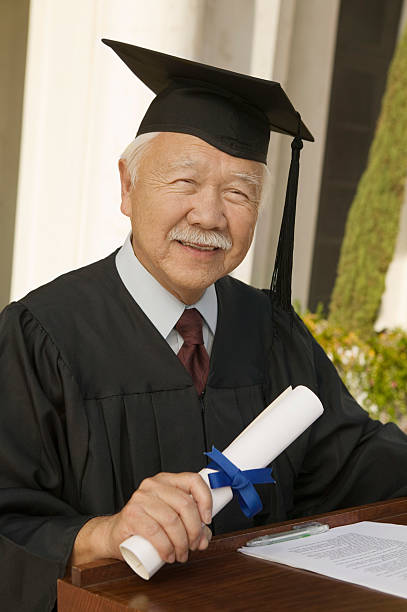 istock Senior Graduate with Diploma 468819293
