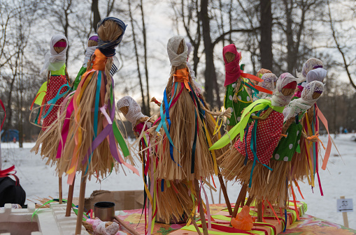 Russian folk festival - off winter. Merry festivities with the burning effigy of winter and folk games