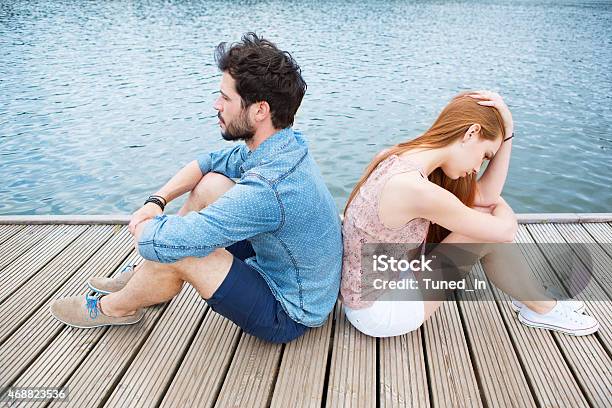 Young Couple Having Relationship Problems Stock Photo - Download Image Now - Back To Back, Couple - Relationship, Sadness