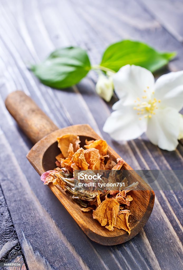 jasmin tea jasmin tea and jasmin flowers on the wooden table 2015 Stock Photo