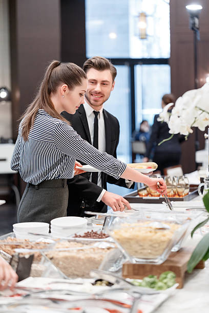 istock Business professionals by the buffet table 468829562