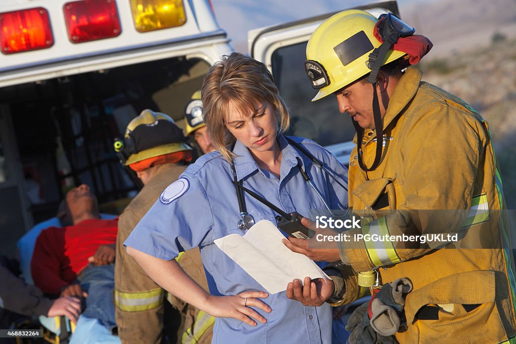 Fire Fighters and Paramedics Paramedic Stock Photo