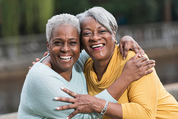 istock Two senior African American women hugging 468836398