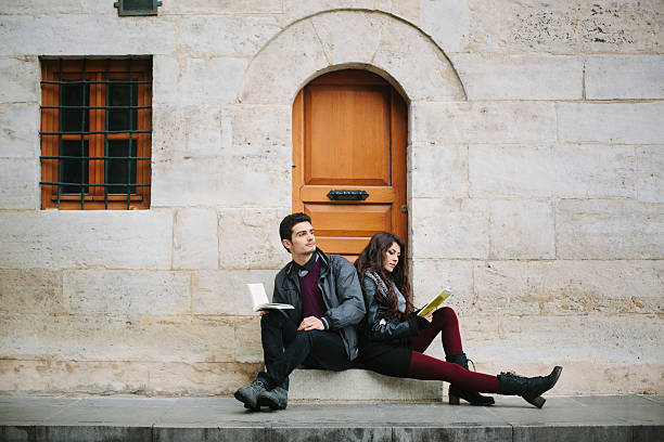 istock Couple reading books 468837118