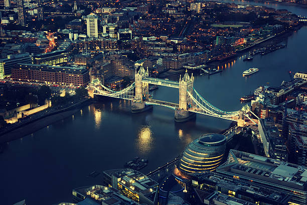 istock London at night with urban architectures and Tower Bridge 468837190