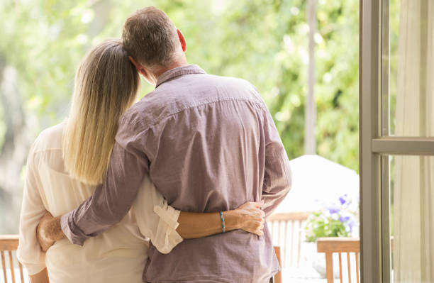 istock Senior couple hugging in doorway 468837627
