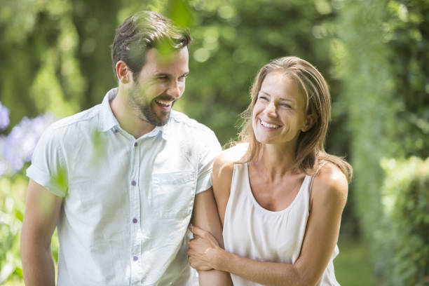 istock Couple walking together outdoors 468837697