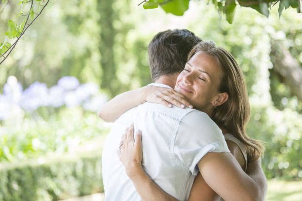 istock Couple hugging outdoors 468837709