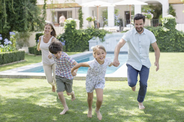 istock Family running together in backyard 468837717