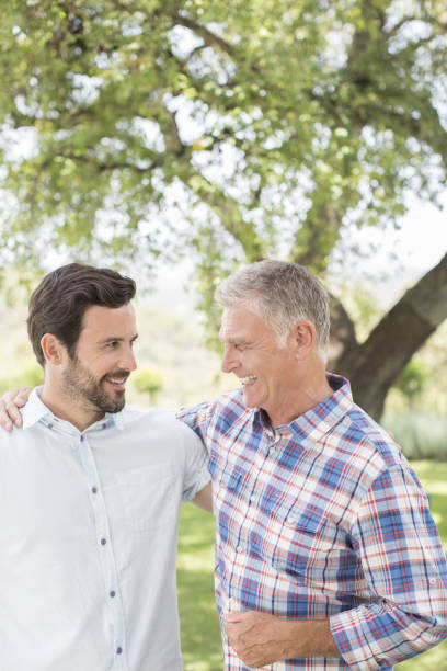 istock Father and son hugging outdoors 468837719