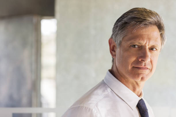 istock Businessman smiling in office 468837867