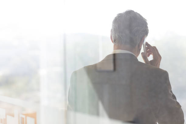 istock Businessman talking on cell phone in office 468837941