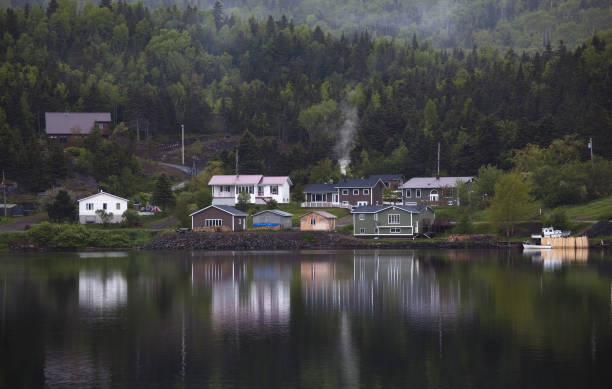 istock Houses along calm bay 468838205