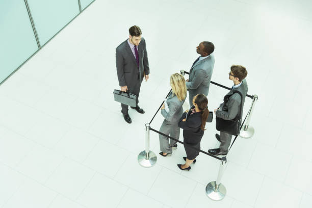 istock Businessman standing outside roped-off square 468838761
