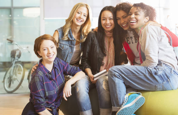 istock Women smiling together on beanbag 468838785