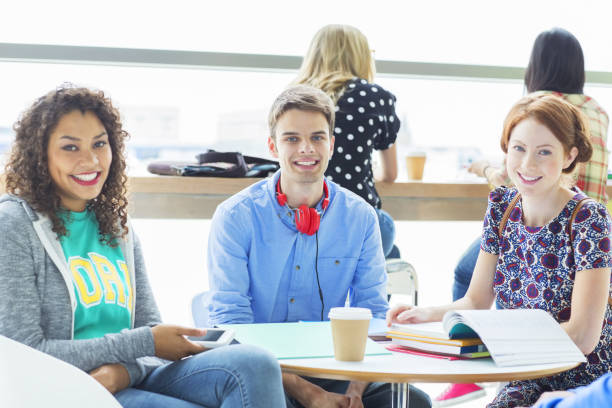 istock University students smiling in lounge 468839053