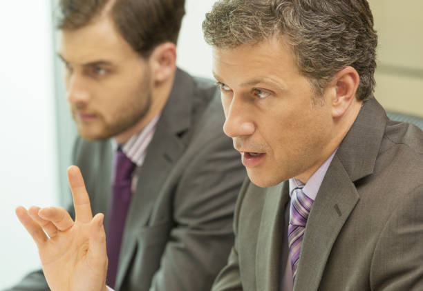 istock Businessman talking in meeting 468839205