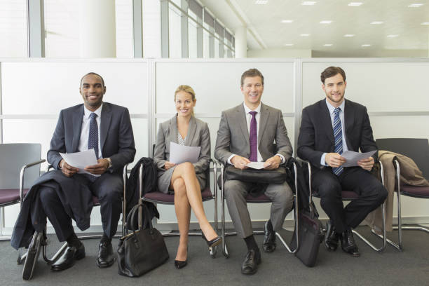 istock Business people sitting in waiting area 468839353