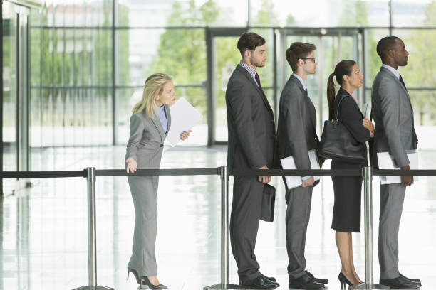 istock Business people waiting in line 468839427