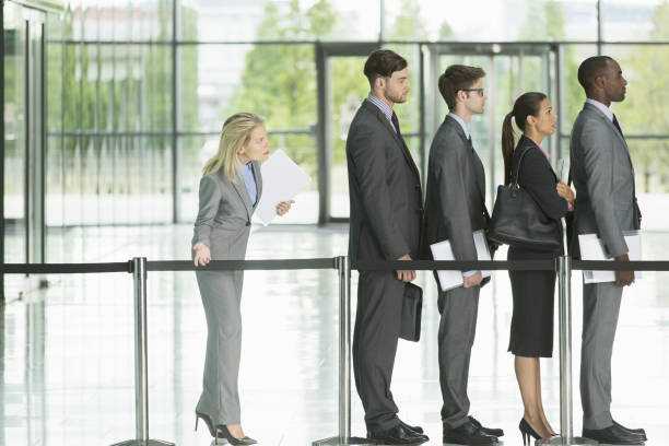 Business people waiting in line  impatient stock pictures, royalty-free photos & images