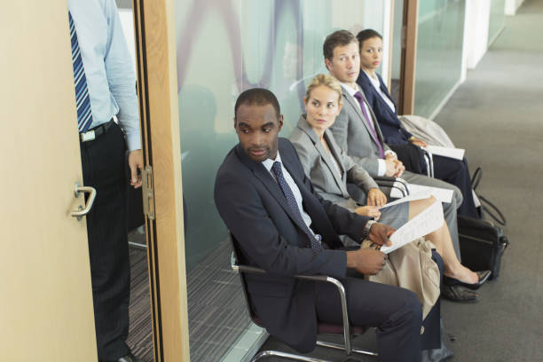 istock Business people sitting in waiting area 468839459