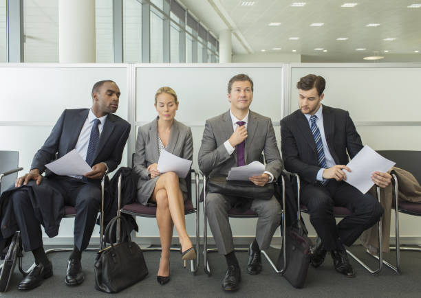 istock Business people sitting in waiting area 468839463