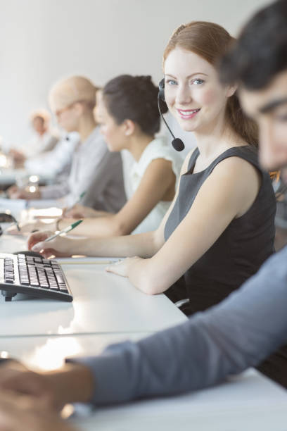 istock Businesswoman wearing headset in office 468839577
