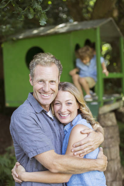 istock Smiling couple hugging outdoors 468840235