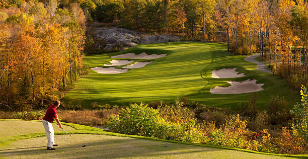 istock Male Caucasian Golfer Driving Off The Tee in Fall 468842102