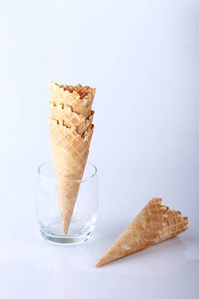 istock row of ice cream cones on white background 468843444