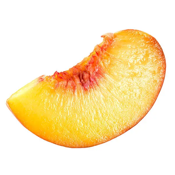 Photo of Peach. Slice of fruit isolated on white.