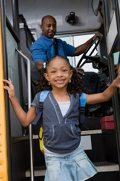 istock Girl Getting Down From The Bus 468846924
