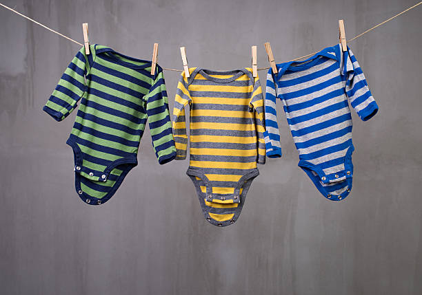 istock Baby laundry hanging on a clothesline 468847324
