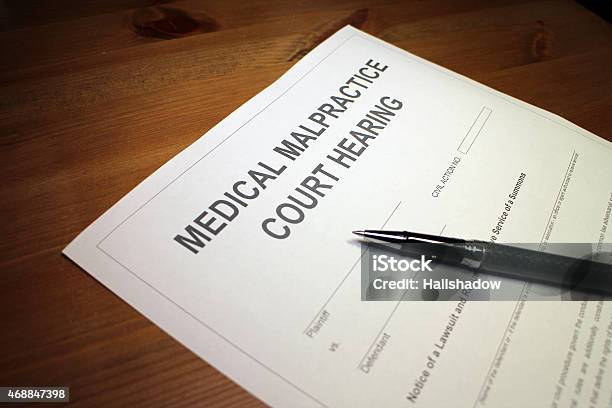Medical Malpractice Court Hearing Stock Photo - Download Image Now - 2015, Application Form, Authority