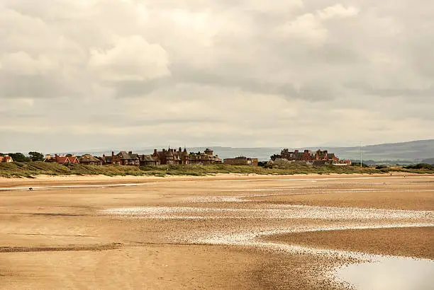 View of the town of Troon in Scotland. Low tide