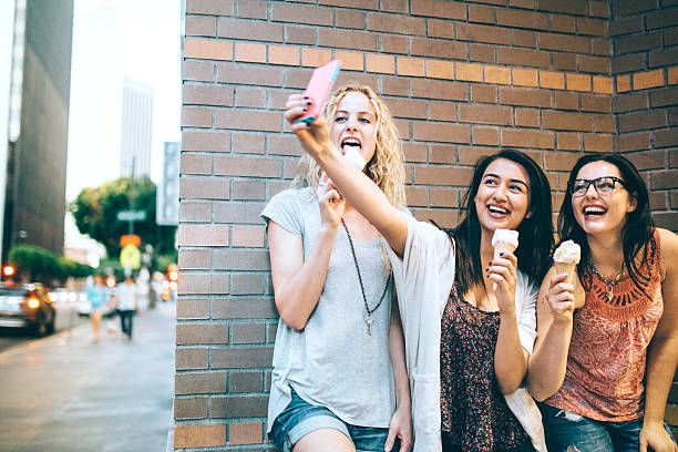 istock Girl Friends Taking Selfie 468852846