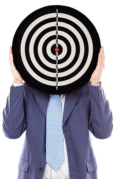 istock Businessman covering his face with a dartboard 468857685