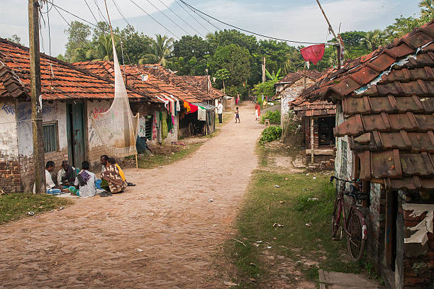 Life in rural India. Diamond Harbour, India - November 16, 2013: India population of approx. 1.2 billion people, which is 1/6 of the world population. Society is very diverse ethnic and religious. 60% of the population works in agriculture. The share of agriculture in GDP of India is 20%. village stock pictures, royalty-free photos & images