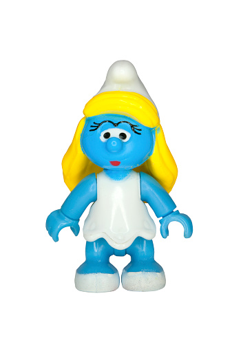 Adelaide, Australia - September 14, 2014: A studio shot of a Smurfette Mega Bloks Figurine from the animated series. The Smurfs are a popular worldwide comic and animated series.