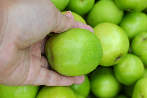 istock Green apples in the market 468862996