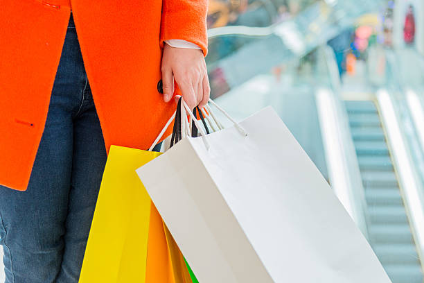 istock holding shopping bags 468864030