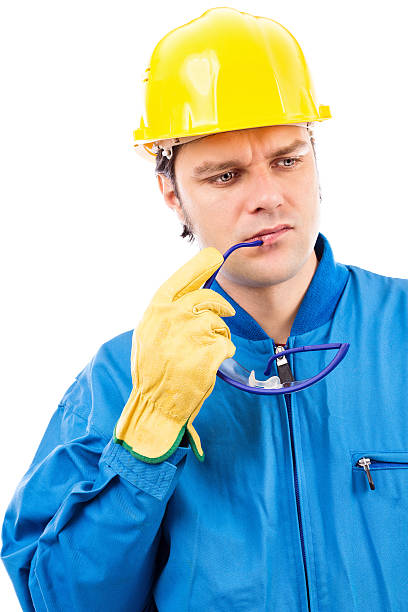 istock Portrait of a thoughtful construction worker with helmet 468867627