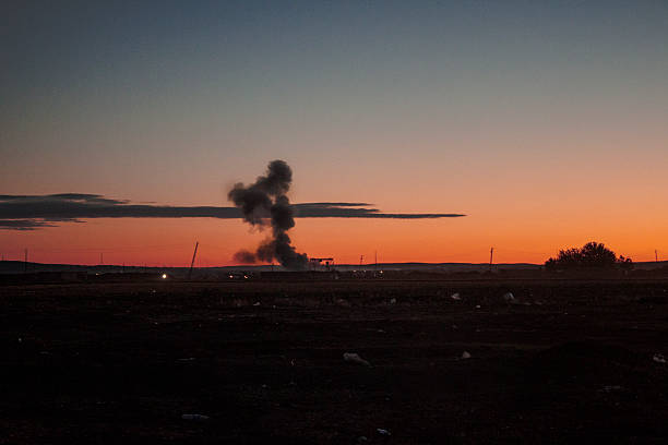 Exploding mushroom bomb at sunset stock photo