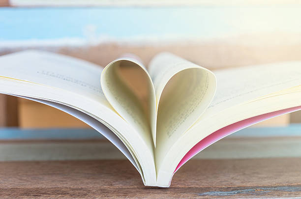 istock Heart shaped padlock with key and Heart book 468874126