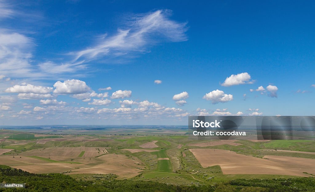 View From The Top Of The Hills Beautiful view from the top of the hill , sun rays coming out of clouds , 2015 Stock Photo