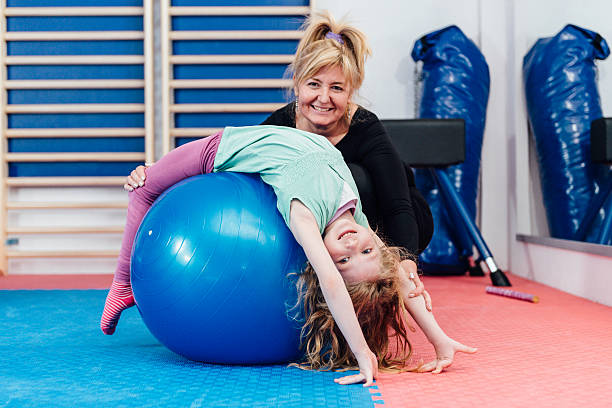 istock Preschooler at corrective gymnastics class 468876610