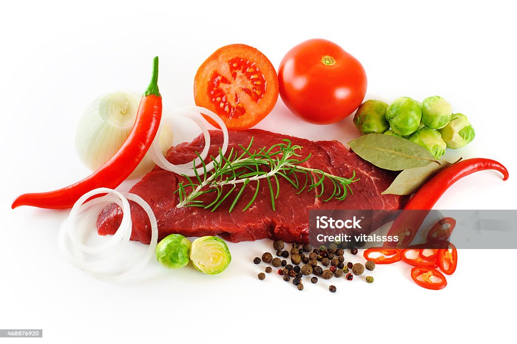Meat and vegetables. Fresh meat and vegetables isolated on white background. 2015 Stock Photo