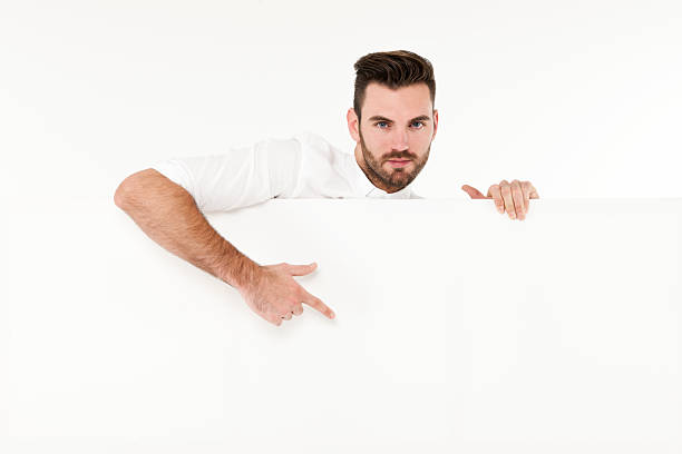 istock Young business man showing blank signboard 468877094