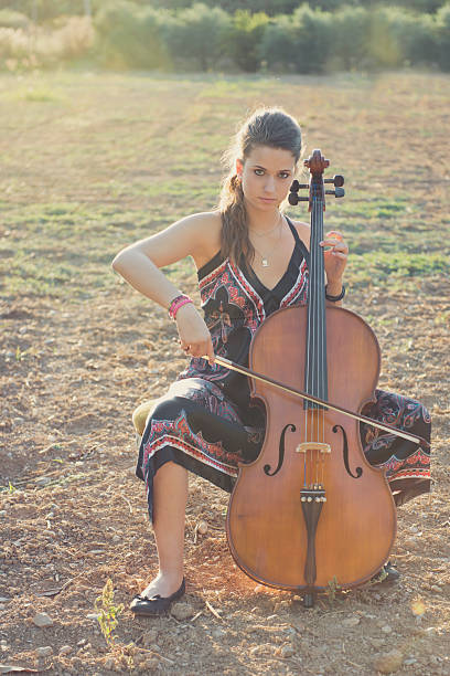 istock Woman with cello 468877735
